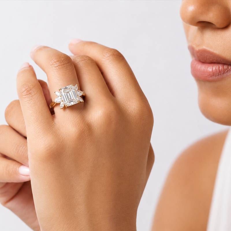 Emerald Shoulder Set Engagement Ring