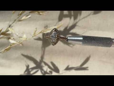 Marquise-Diamant-Ring mit einzelnem Halo-Schulterteil