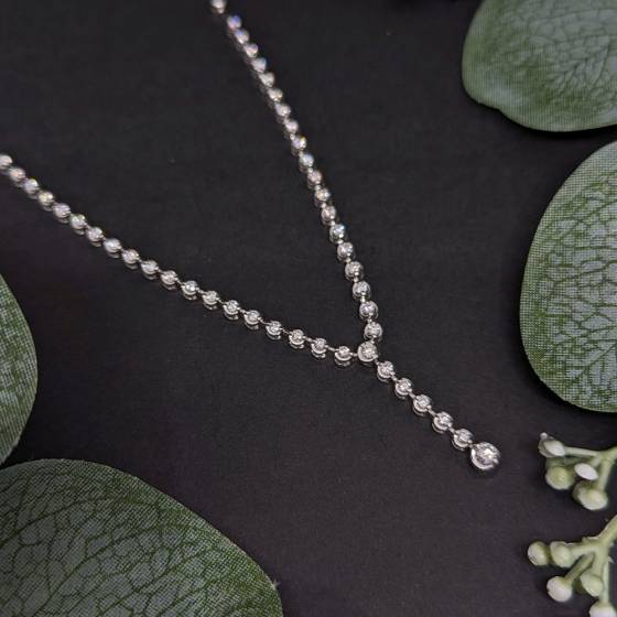 Halskette mit einem runden, natürlichen Diamanten (1,25 ct, VS/E-F).
