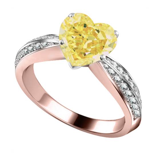 Ring mit gelbem herzförmigem Diamanten an der Schulter