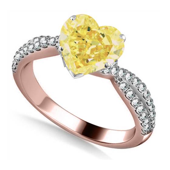 Ring mit gelbem herzförmigem Diamanten an der Schulter