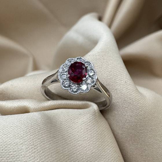 0.72ct VS2/G Oval Gemstone Flower Halo Ring in 18k White Gold