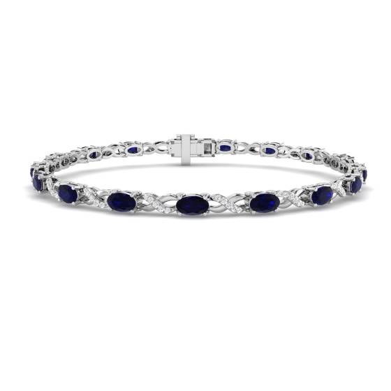 Armband mit ovalem, blauem Saphir (5,10 ct, VS/E-F) und runden Diamanten