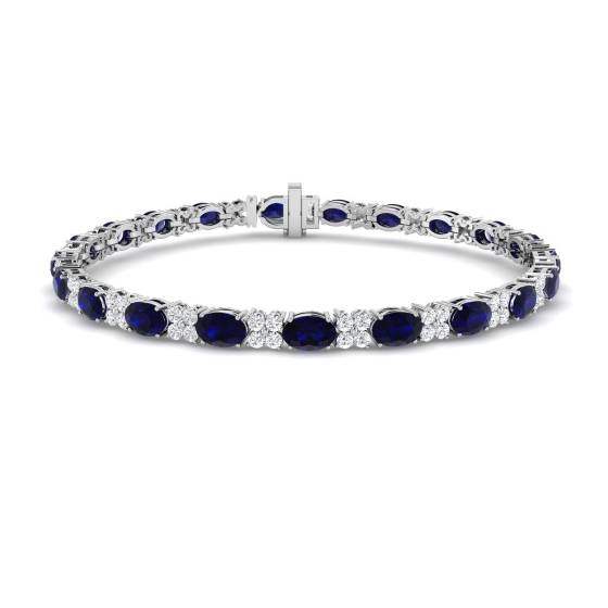 Armband mit ovalem, blauem Saphir (7,90 ct, VS/E-F) und runden Diamanten