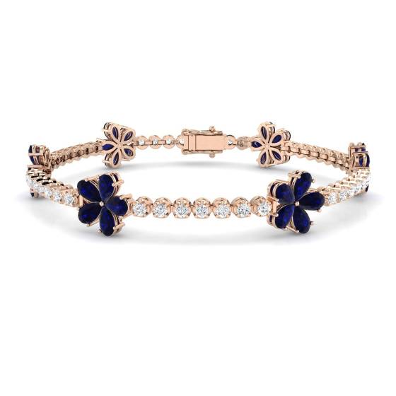 Designerarmband mit 7,80 ct VS/E-F Birnen-Saphir und runden Diamanten