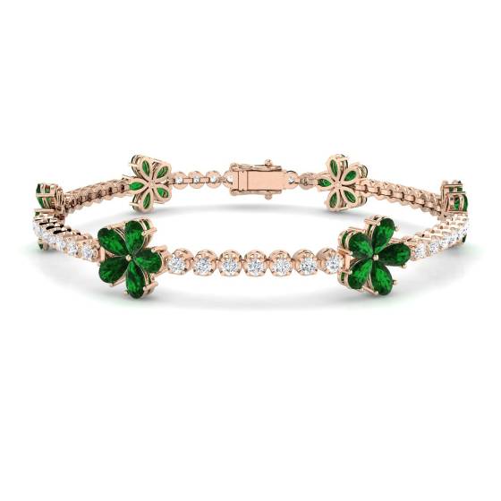 Designerarmband mit birnenförmigem Smaragd (6,20 ct, VS/E-F) und runden Diamanten