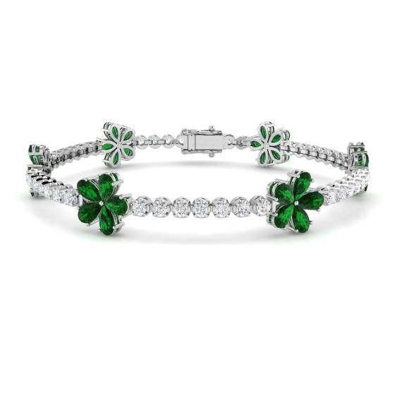 Designerarmband mit birnenförmigem Smaragd (6,20 ct, VS/E-F) und runden Diamanten