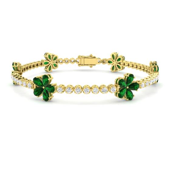 Designerarmband mit birnenförmigem Smaragd (6,20 ct, VS/E-F) und runden Diamanten