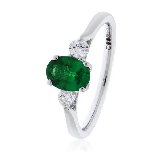 Trilogie-Ring mit ovalem grünem Smaragd und Diamanten (1,20 ct).