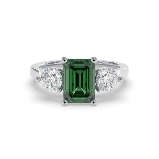 Trilogie-Ring mit grünem Smaragd und Diamanten (0,70 ct).