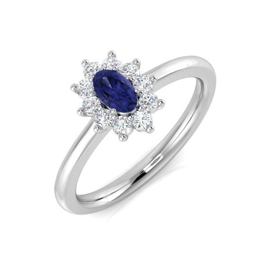 Ovaler Tansanit (0,45 ct, VS/E-F) und Halo-Ring mit rundem Diamanten