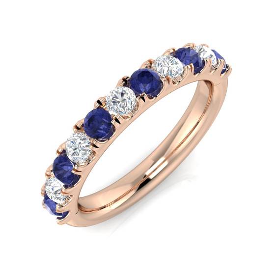 Trilogie-Ring mit 0,80 ct VS/E-F rundem Tansanit und rundem Diamanten