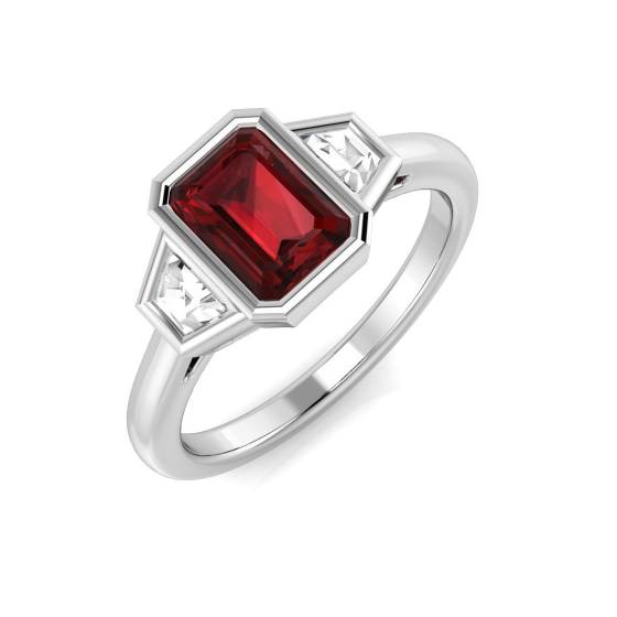 Ring mit 1,25 ct VS/E-F Smaragd und Baguette-Diamanten sowie Granat in Lünettenfassung