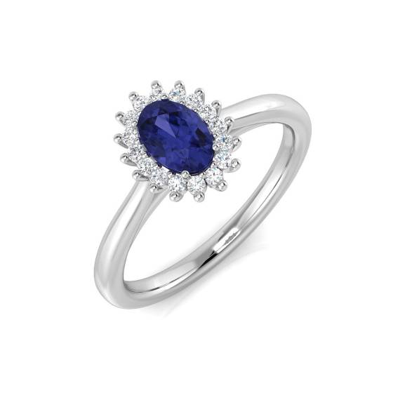 Ovaler Tansanit (0,75 ct, VS/E-F) und Halo-Ring mit rundem Diamanten