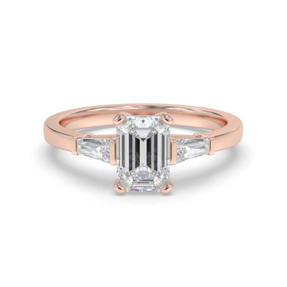Eleganter Trilogie-Ring mit Smaragd und Baguette-Diamanten