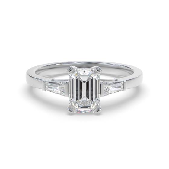 Eleganter Trilogie-Ring mit Smaragd und Baguette-Diamanten