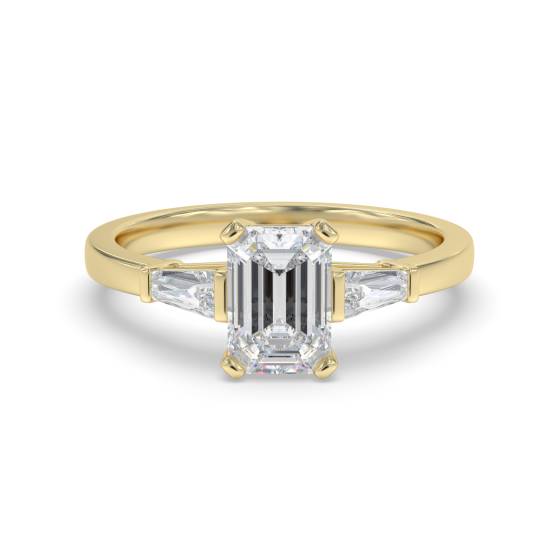 Eleganter Trilogie-Ring mit Smaragd und Baguette-Diamanten