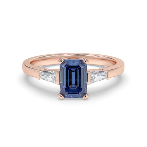 Trilogie-Ring aus smaragdgrünem Saphir und Baguette-Diamanten
