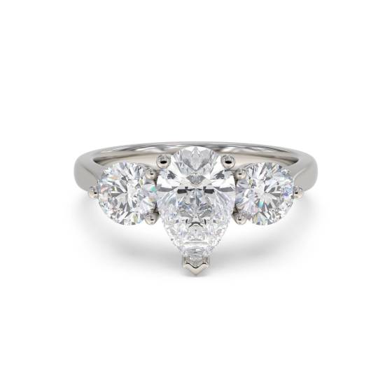 Stilvoller Trilogie-Ring mit Birnen- und Runddiamanten