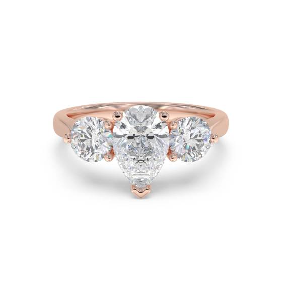 Stilvoller Trilogie-Ring mit Birnen- und Runddiamanten