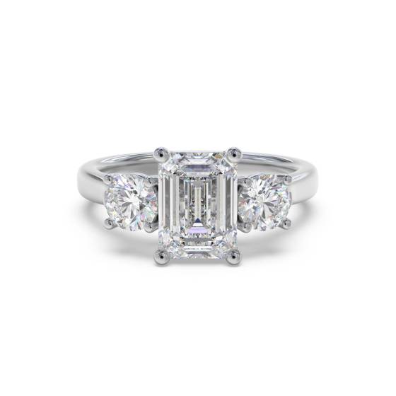 Klassischer Trilogie-Ring mit Smaragd und rundem Diamanten