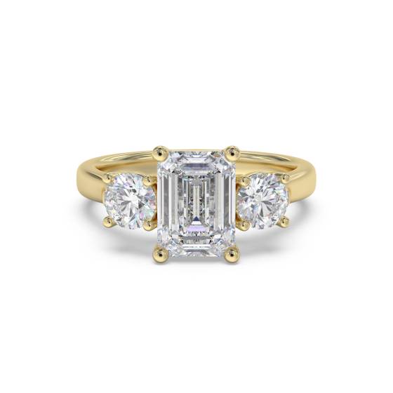 Klassischer Trilogie-Ring mit Smaragd und rundem Diamanten