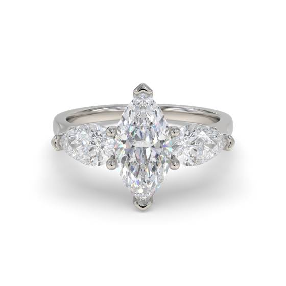 Einzigartiger Trilogie-Ring mit Marquise- und Birnenschliff-Diamanten