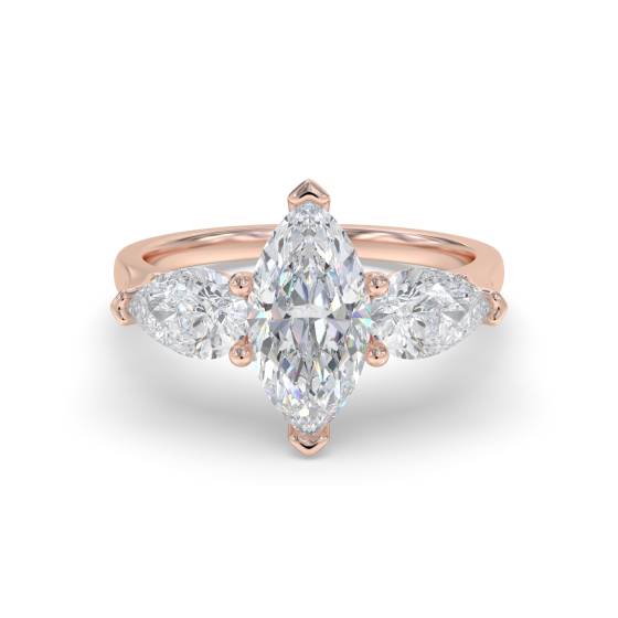 Einzigartiger Trilogie-Ring mit Marquise- und Birnenschliff-Diamanten