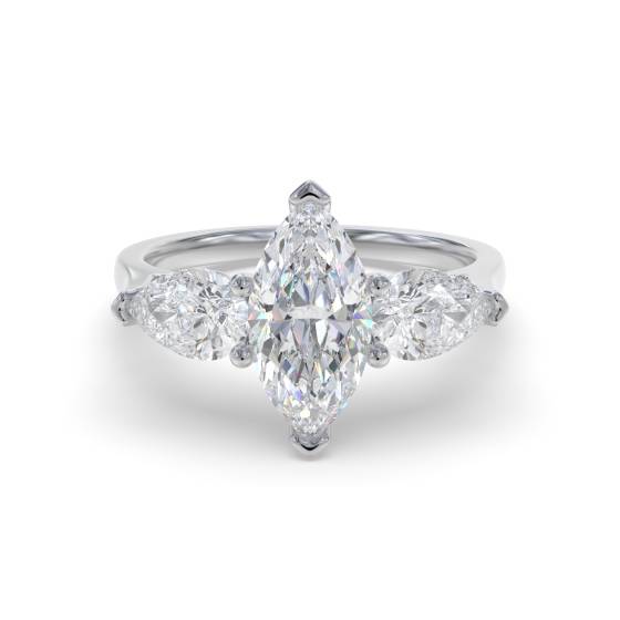Einzigartiger Trilogie-Ring mit Marquise- und Birnenschliff-Diamanten