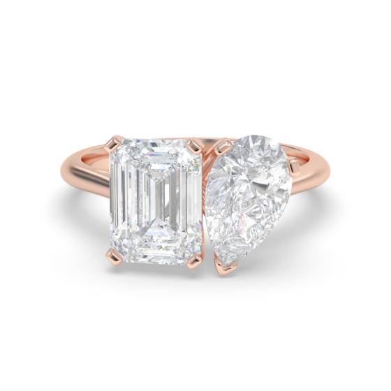 Smaragd- und Birnenförmiger Zweistein-Diamantring