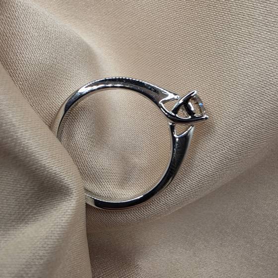 0.64ct I1/H Natural Round Diamond Solitaire Ring in 18k White Gold