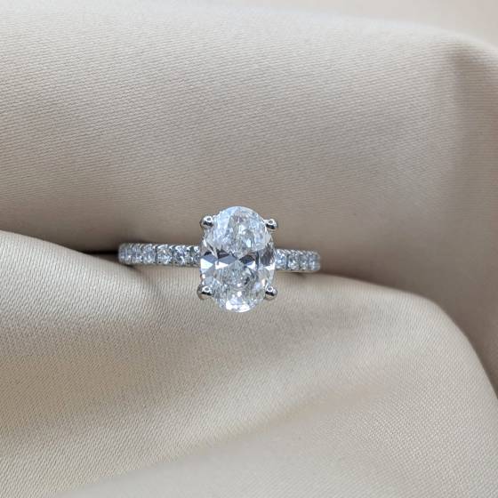 2.03ct VVS2/D Lab Grown Oval Diamond Hidden Halo Shoulder Set Ring in Platinum
