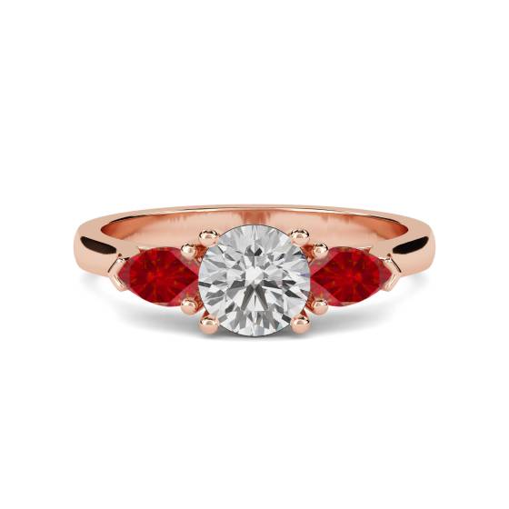 Trilogie-Ring mit Diamanten im Zentrum und Rubinen an den Seiten