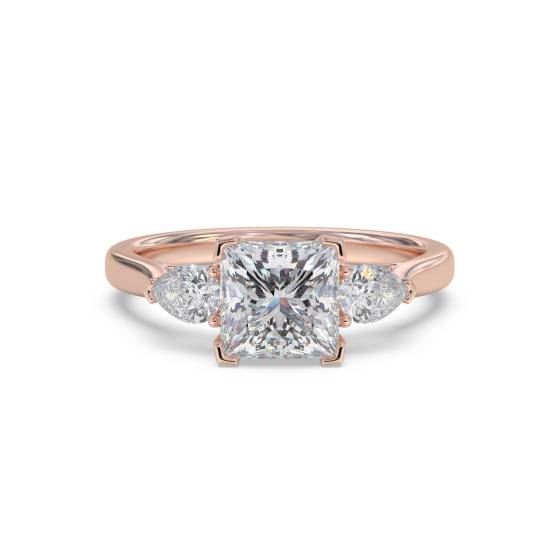 Eleganter Trilogie-Ring aus Prinzess- und Birnenschliff-Diamanten