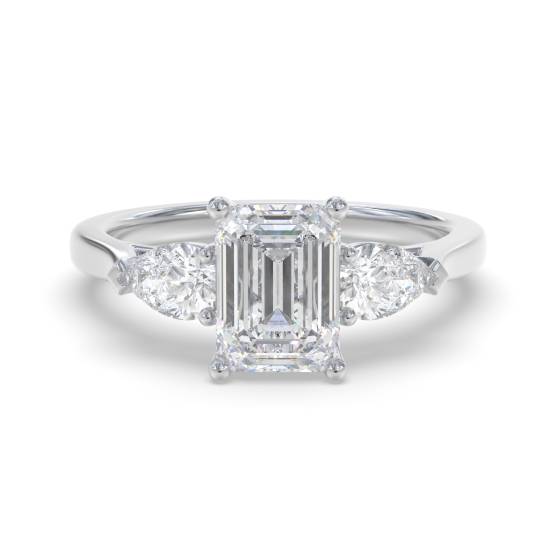 Eleganter Trilogie-Ring aus Smaragd und Birnendiamant