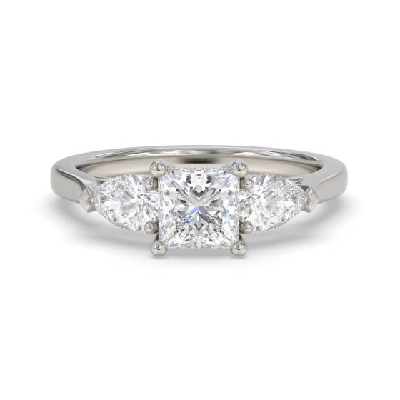 Eleganter Trilogie-Ring aus Prinzess- und Birnenschliff-Diamanten