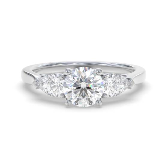 Eleganter Trilogie-Ring mit runden und birnenförmigen Diamanten