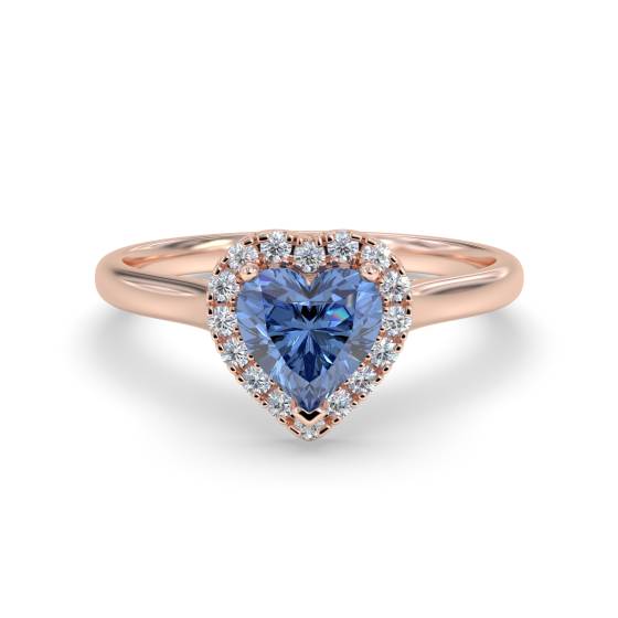 Ring mit blauem Saphir im Herzschliff und Diamanten im Halo-Design