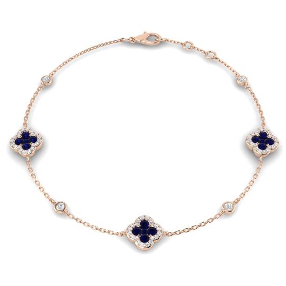Armband mit rundem, blauem Saphir und Kleeblattmotiv