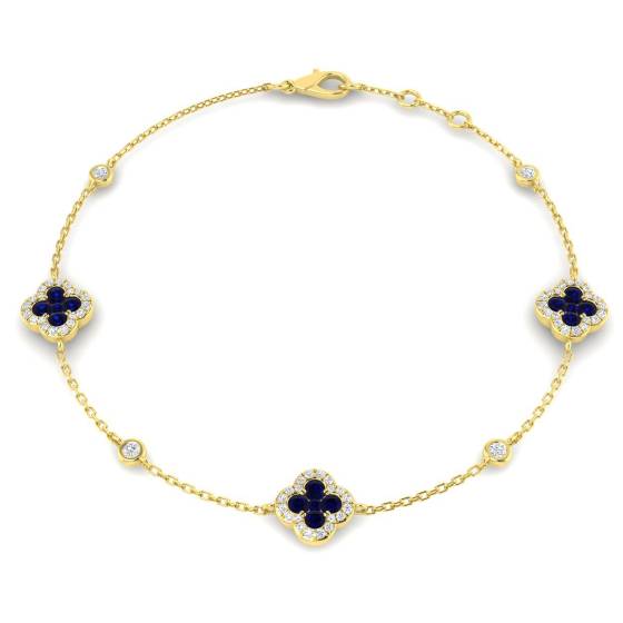 Armband mit rundem, blauem Saphir und Kleeblattmotiv