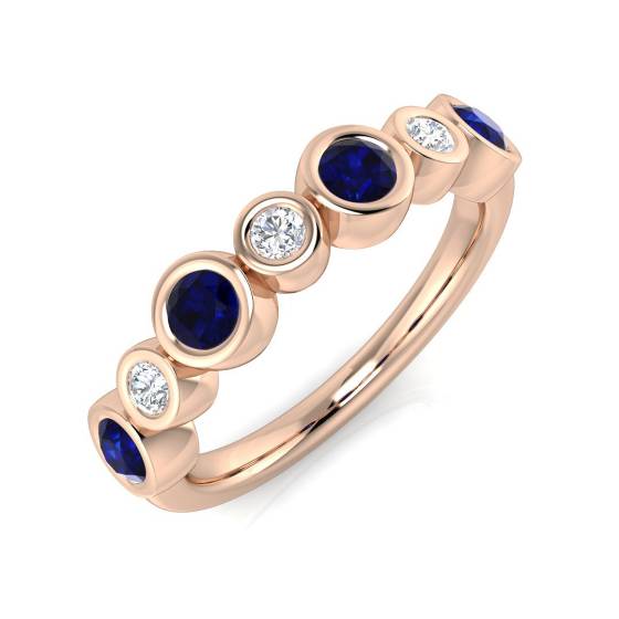 Ring mit rundem, blauem Saphir in Lünettenfassung