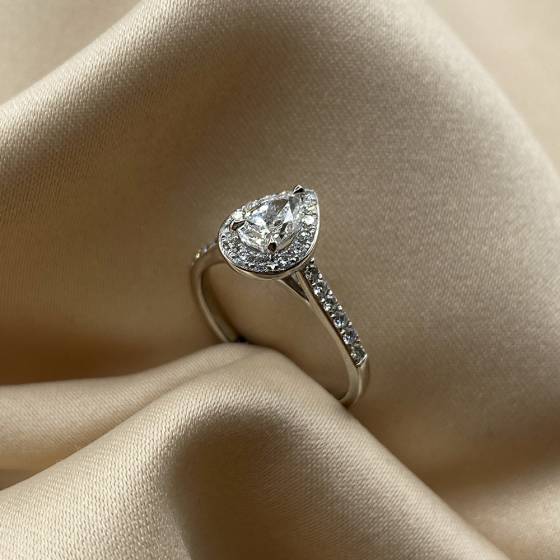 1.15ct SI1/G Natural Pear Diamond Shoulder Set Ring in Platinum