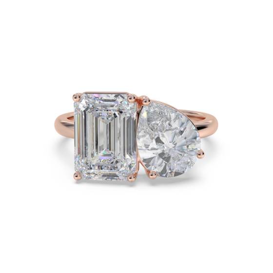 Smaragd- und Birnenförmiger Zweistein-Diamantring