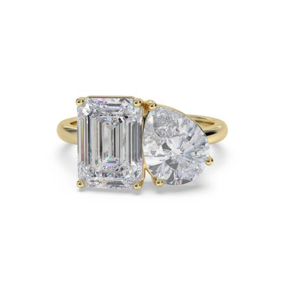 Smaragd- und Birnenförmiger Zweistein-Diamantring