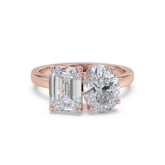 Smaragd- und Oval-Diamantring mit zwei Steinen