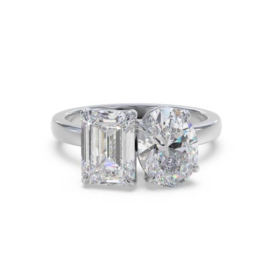 Smaragd- und Oval-Diamantring mit zwei Steinen