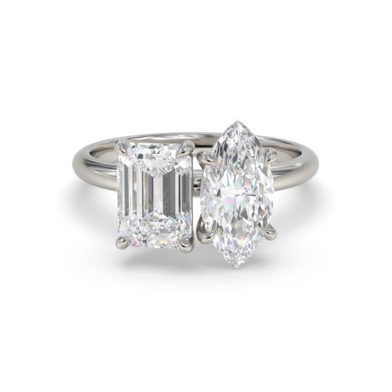 Zweisteinring mit Smaragd und Marquise-Diamanten