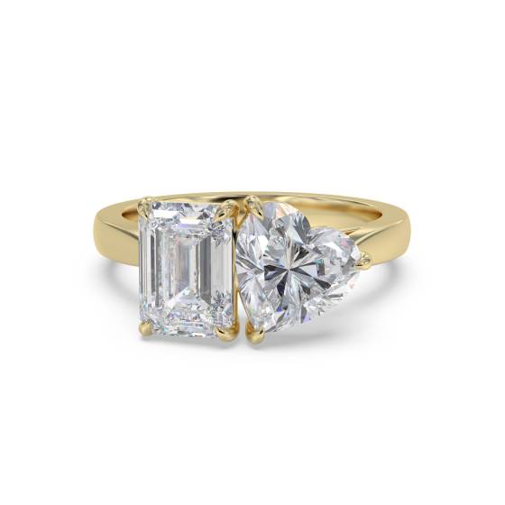 Smaragd- und Herz-Diamantring mit zwei Steinen
