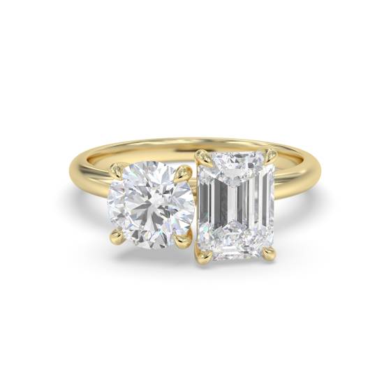Zweisteiniger Diamantring mit rundem und smaragdgrünem Diamanten