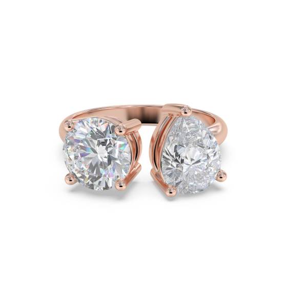 Zweistein-Diamantring mit rundem und birnenförmigem Schliff